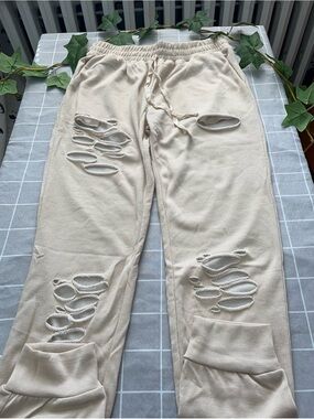 Dice distressed Ripped joggers sweatpants cream size (s).